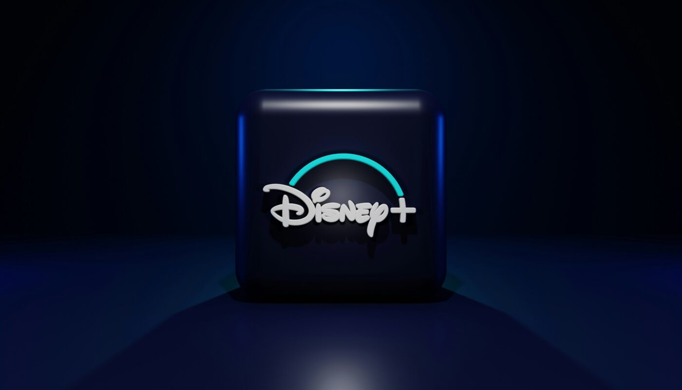 Disney+ logo glowing on a dark screen