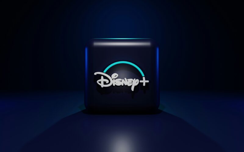 Disney+ logo glowing on a dark screen
