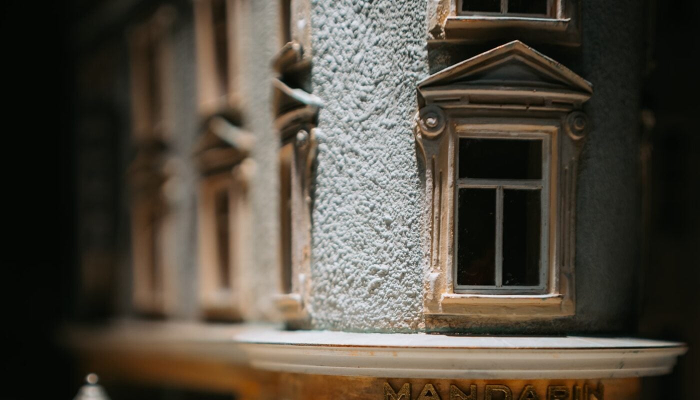 A detailed scale model of a shopfront with a street lamp outside (photo: Emanuel Haas / Unsplash)