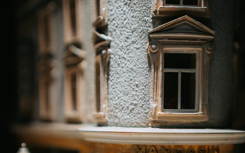 A detailed scale model of a shopfront with a street lamp outside (photo: Emanuel Haas / Unsplash)
