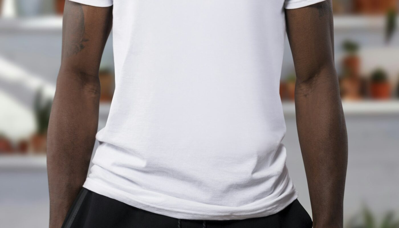 A man wearing a plain white crew neck t-shirt (photo: Anomaly / Unsplash)