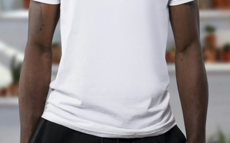 A man wearing a plain white crew neck t-shirt (photo: Anomaly / Unsplash)