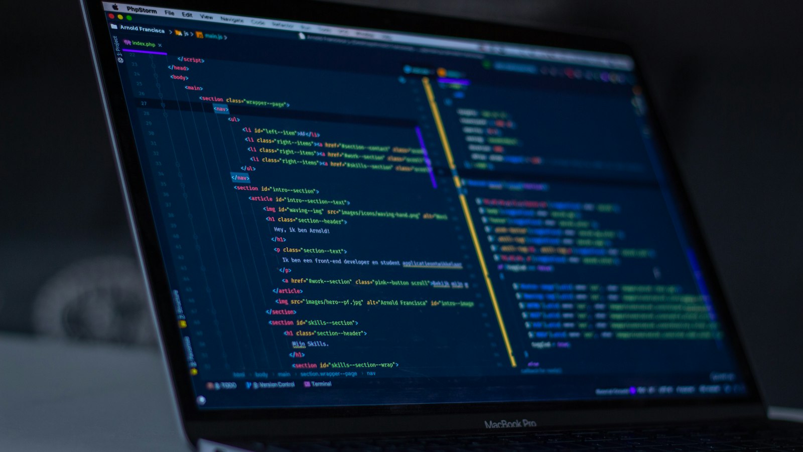 Laptop screen showing website code (photo: Arnold Francisca / Unsplash)